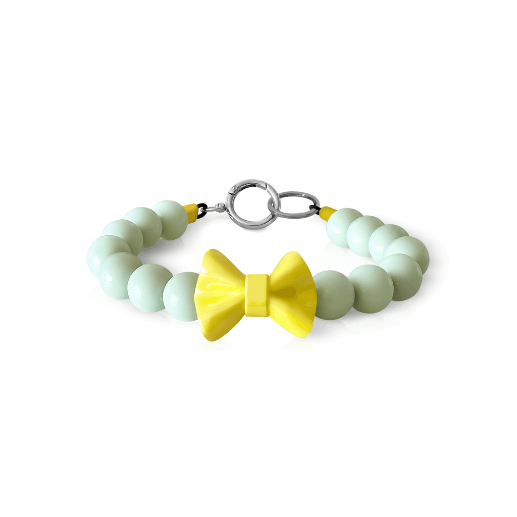 JOGIA glow-in-the-dark beaded collar photographed on a white background.